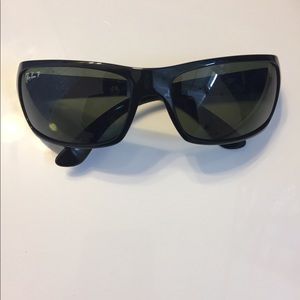 Men’s black RayBan glasses